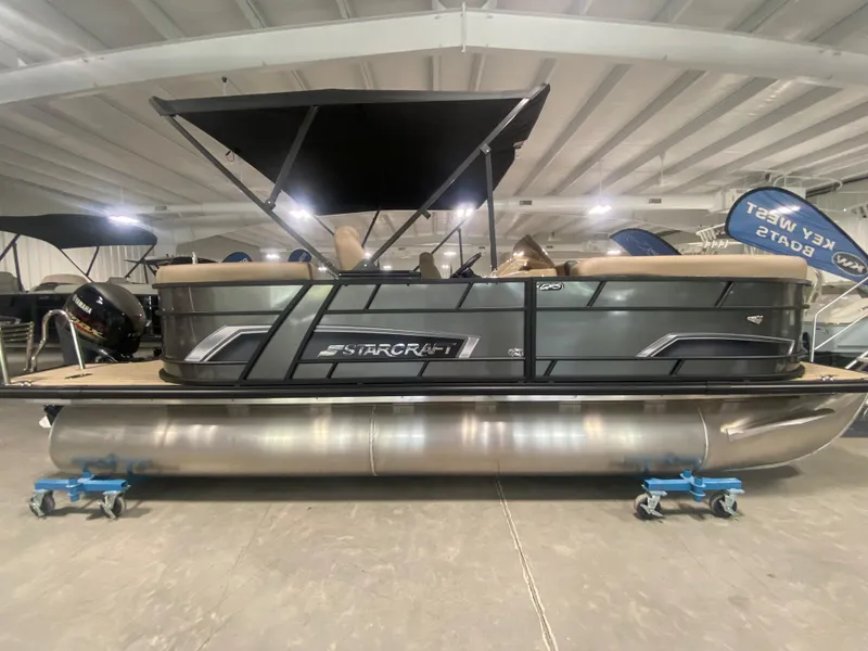 The Image of 2024 Starcraft EXS 1 pontoon boat in showroom. - 0