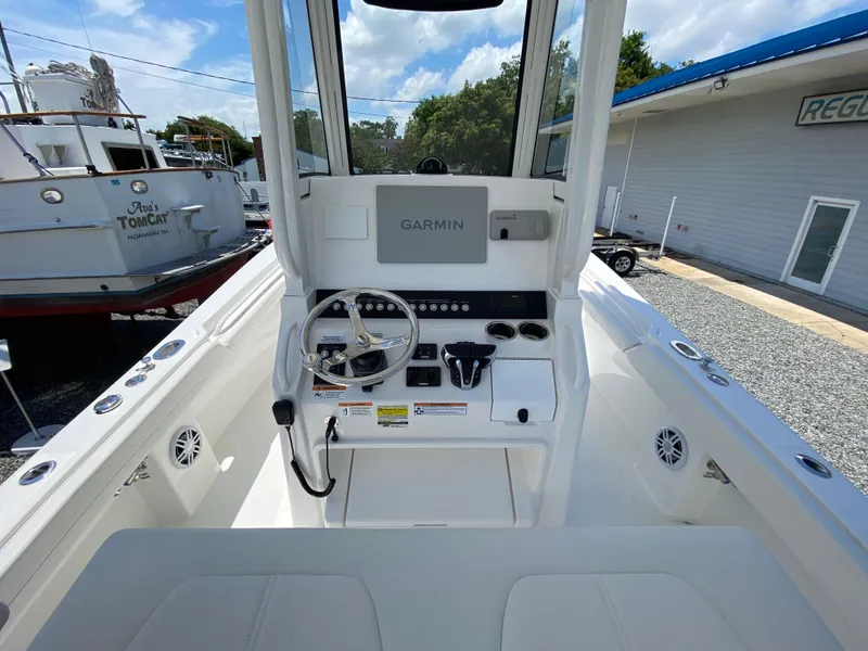 Slide: The Image of 2024 Regulator 23 boat console with Garmin navigation system. - 29