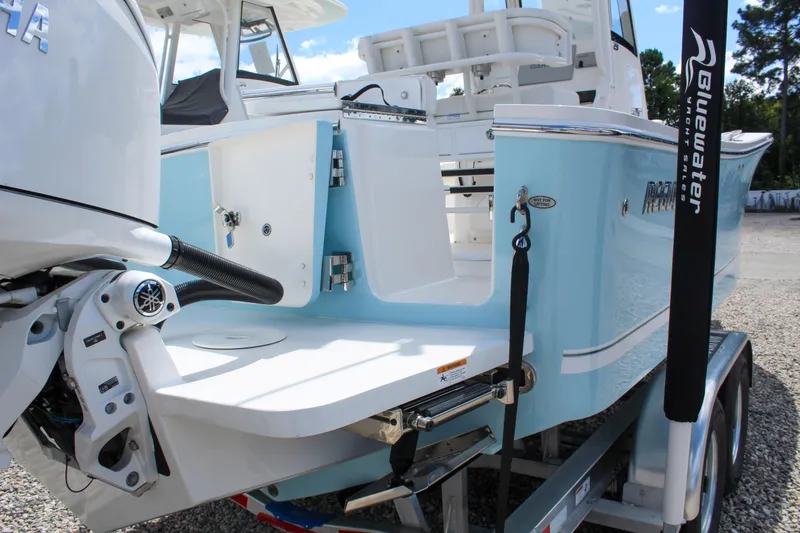 Slide: The Image of 2024 Regulator 23 boat with Yamaha engine on trailer. - 5