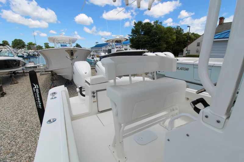 Slide: The Image of 2024 Regulator 23 boat interior with white seating and console. - 8