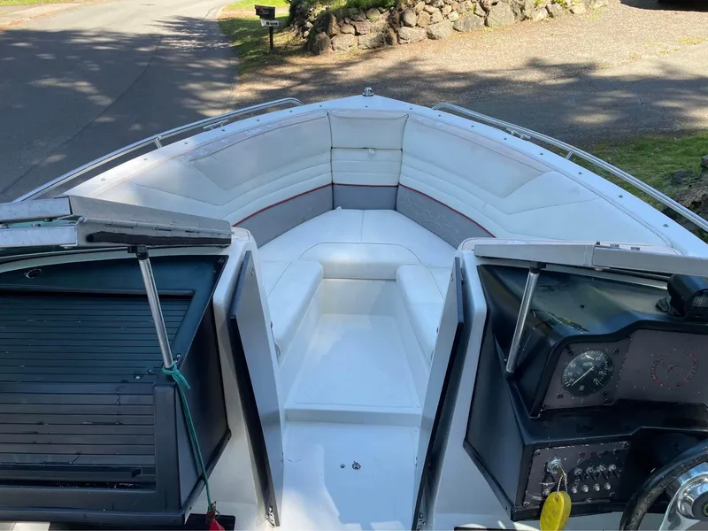 Slide: The Image of 1989 Cobalt CONDURRE boat interior with white seating and dashboard. - 7