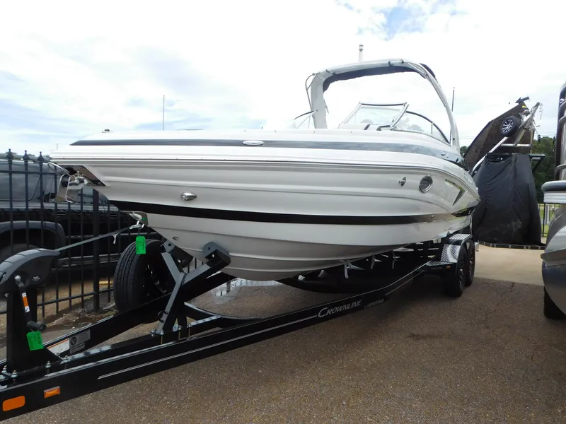 The Image of 2024 Crownline 280 SS boat on trailer in indoor storage facility. - 0