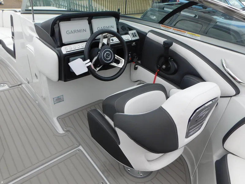 Slide: The Image of Trailer wheel of 2024 Crownline 280 SS boat on concrete floor. - 4