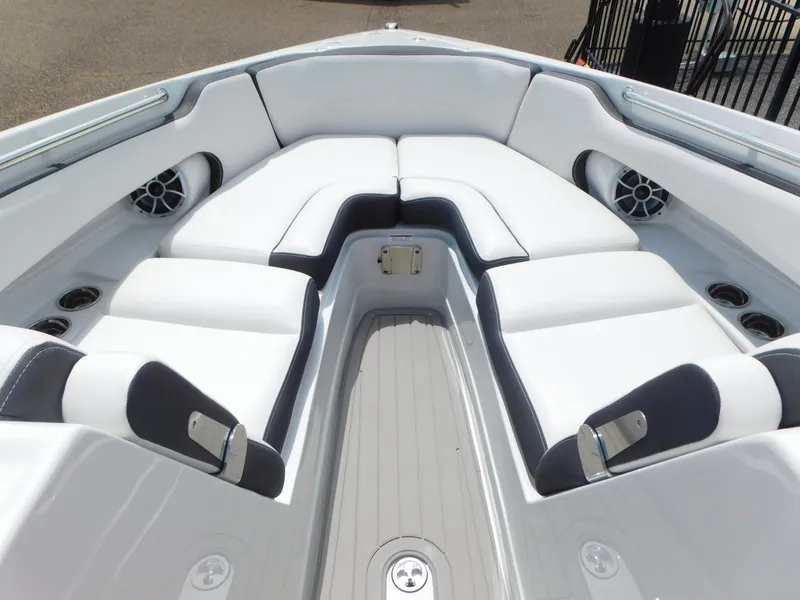 Slide: The Image of 2024 Crownline 280 SS boat interior with illuminated dashboard and steering wheel. - 7