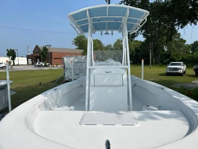 Slide: The Image of 2024 Savannah SS19 boat with T-top and spacious deck. - 2