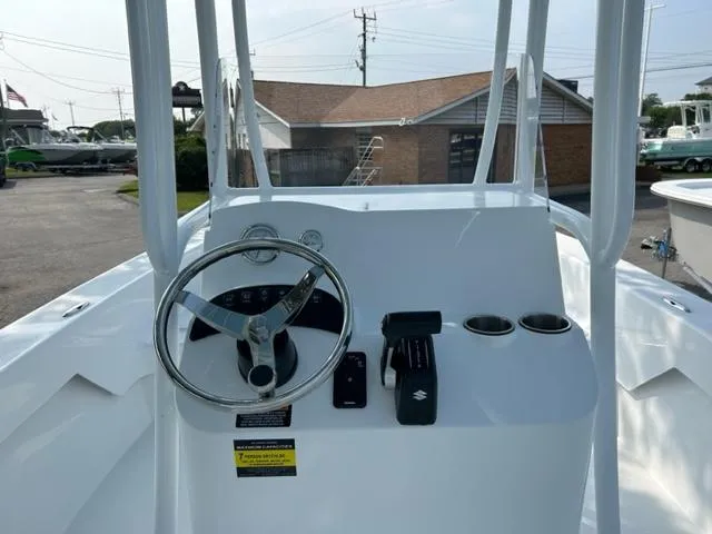 Slide: The Image of 2024 Savannah SS19 boat console with steering wheel and controls. - 9
