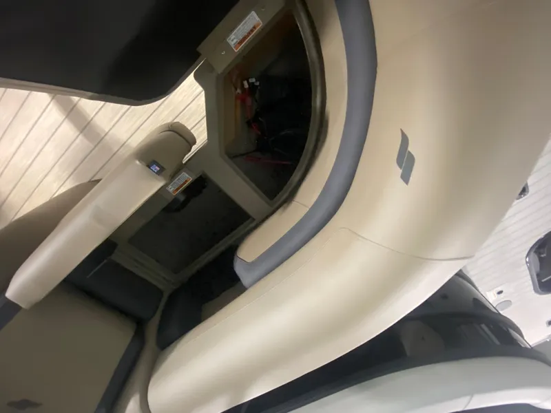 Slide: The Image of Interior seating of 2024 Starcraft EXS 1 boat with beige upholstery. - 6