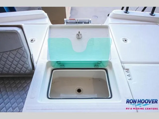 Slide: The Image of 2023 Catalyst Boat Works 2300 BAY livewell with open lid, displayed at Ron Hoover RV & Marine Centers. - 12