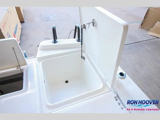 Slide: The Image of 2023 Catalyst Boat Works 2300 BAY with open storage compartment at Ron Hoover RV & Marine Centers. - 15