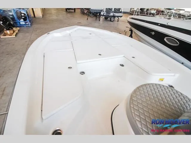 Slide: The Image of 2023 Catalyst Boat Works 2300 BAY deck view in showroom. - 20