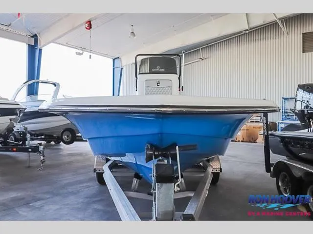 Slide: The Image of 2023 Catalyst Boat Works 2300 BAY in showroom, blue hull, on trailer. - 30
