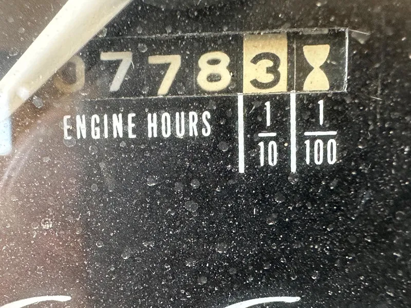 Slide: The Image of Close-up of a 1968 Chris-Craft 35 Commander engine hour meter. - 15
