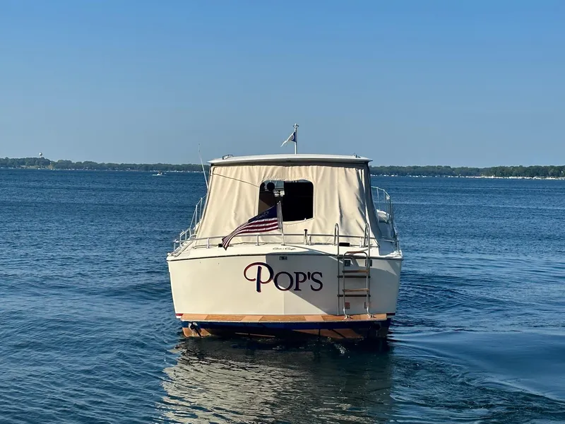 Slide: The Image of 1968 Chris-Craft 35 Commander on calm waters. - 2