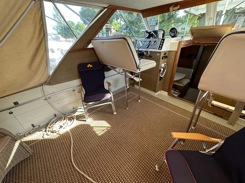 Slide: The Image of Interior of a 1968 Chris-Craft 35 Commander boat with helm station. - 25