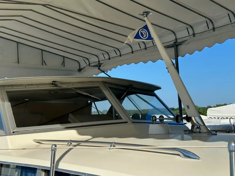 Slide: The Image of 1968 Chris-Craft 35 Commander under a canopy. - 29