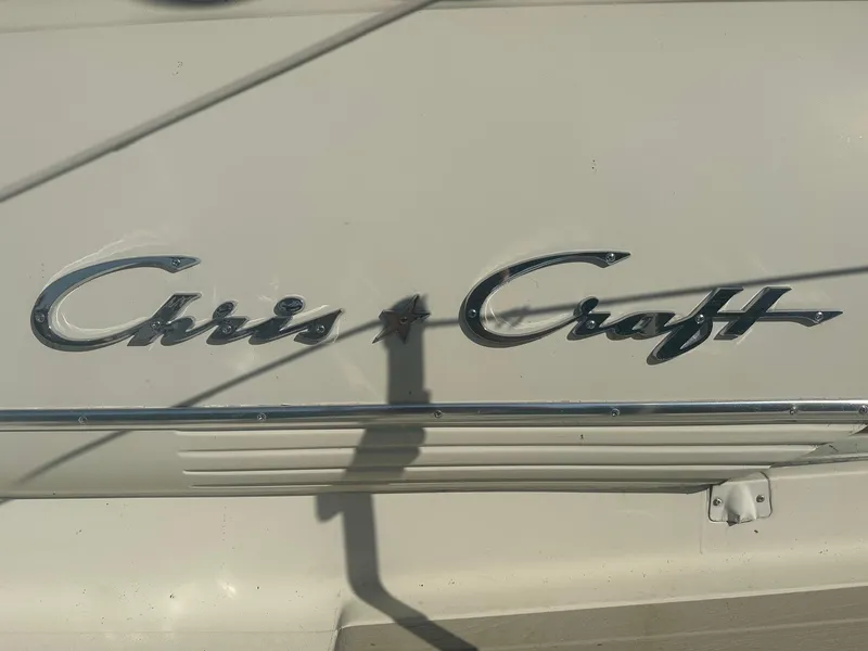 Slide: The Image of Chris-Craft 35 Commander 1968 emblem on boat hull. - 5