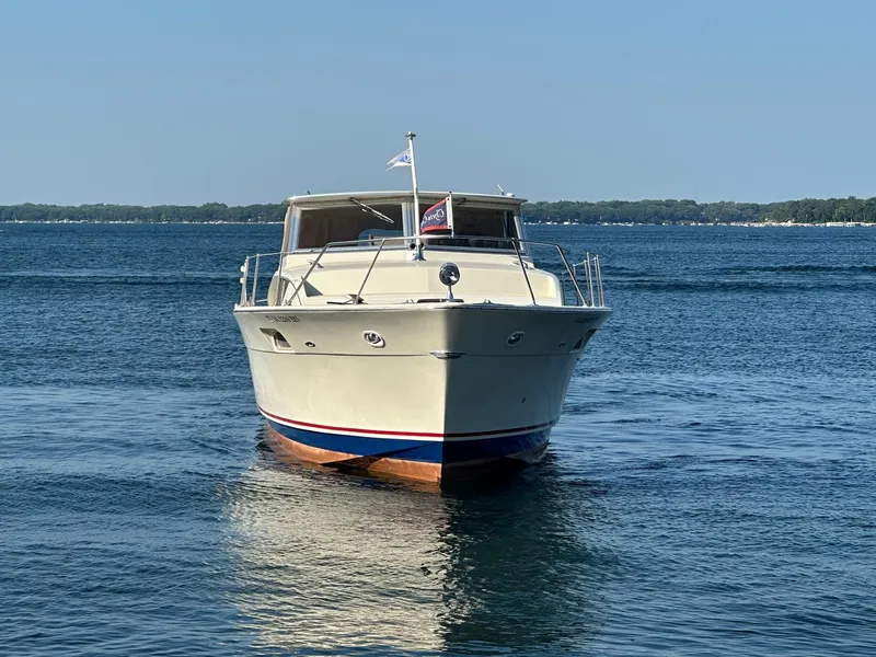 Slide: The Image of 1968 Chris-Craft 35 Commander on calm water. - 6