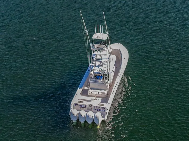 Slide: The Image of 2015 SeaHunter 45 boat cruising on open water. - 20