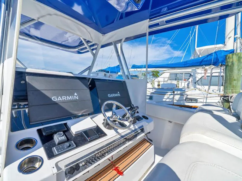 Slide: The Image of SeaHunter 45 2015 boat helm with Garmin navigation system. - 6