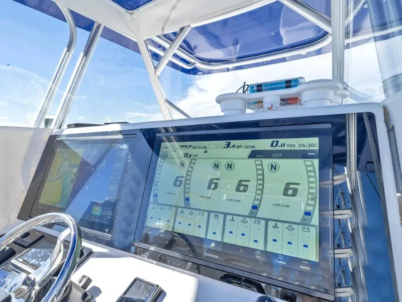 Slide: The Image of SeaHunter 45 2015 boat dashboard with advanced navigation and control systems. - 8