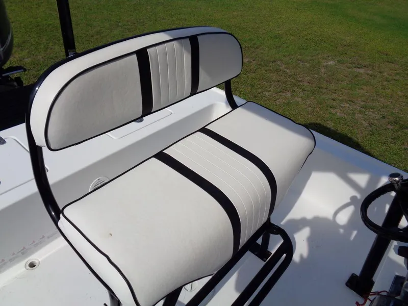 Slide: The Image of 2011 Cape Horn 23 Cape Bay boat seat with white and black upholstery. - 11