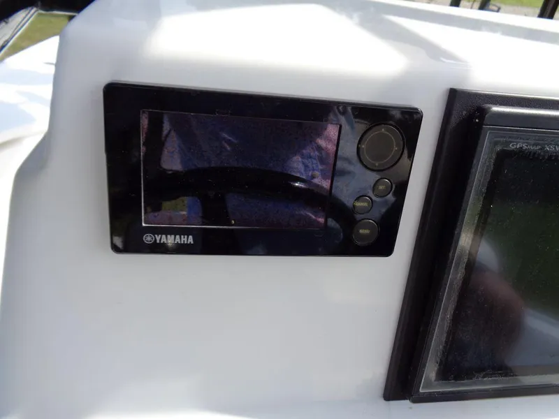 Slide: The Image of Yamaha display on 2011 Cape Horn 23 Cape Bay boat dashboard. - 12