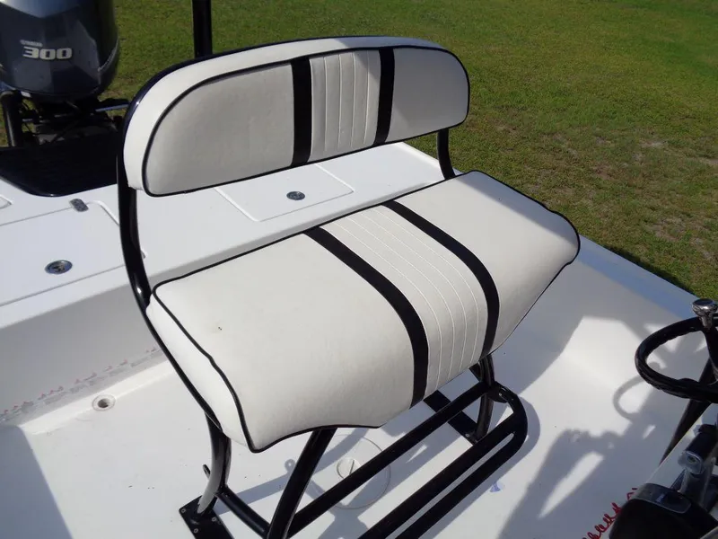 Slide: The Image of 2011 Cape Horn 23 Cape Bay boat seat with white and black upholstery. - 15
