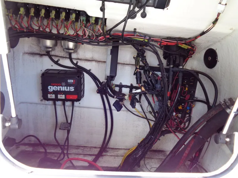 Slide: The Image of Electrical wiring and components inside a 2011 Cape Horn 23 Cape Bay boat. - 19