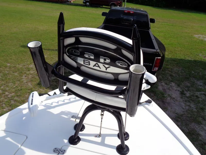 Slide: The Image of 2011 Cape Horn 23 Cape Bay boat with rod holders and seating. - 21