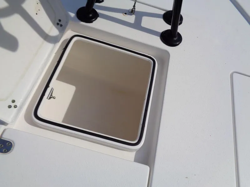 Slide: The Image of Open storage compartment on a 2011 Cape Horn 23 Cape Bay boat. - 23