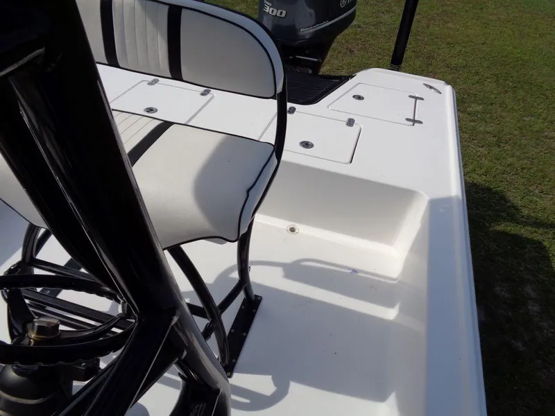 Slide: The Image of 2011 Cape Horn 23 Cape Bay boat interior with seating and storage compartments. - 30