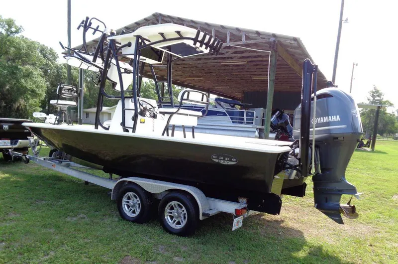 Slide: The Image of 2011 Cape Horn 23 Cape Bay boat on a trailer with Yamaha outboard motor. - 4