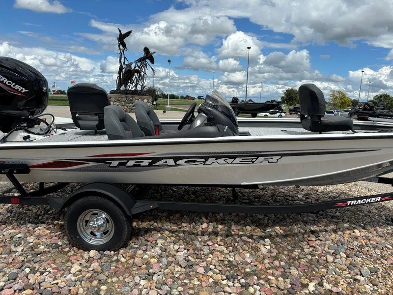 Slide: The Image of 2024 Tracker Pro Team 175 TXW fishing boat on a trailer. - 2