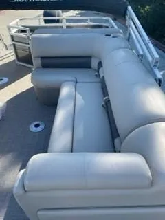 Slide: The Image of 2024 Sun Tracker Fishin' Barge 20 DLX interior seating area. - 16