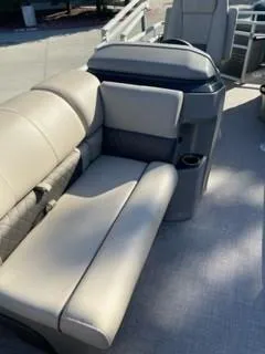 Slide: The Image of 2024 Sun Tracker Fishin' Barge 20 DLX interior seating area. - 17