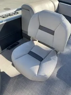 Slide: The Image of 2024 Sun Tracker Fishin' Barge 20 DLX boat seat with gray upholstery. - 19