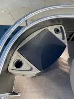 Slide: The Image of 2024 Sun Tracker Fishin' Barge 20 DLX fishing station with cup holders. - 20