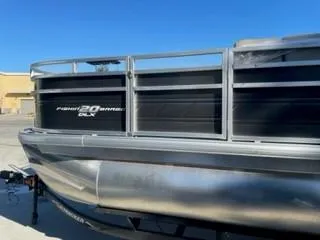 Slide: The Image of 2024 Sun Tracker Fishin' Barge 20 DLX pontoon boat side view. - 4