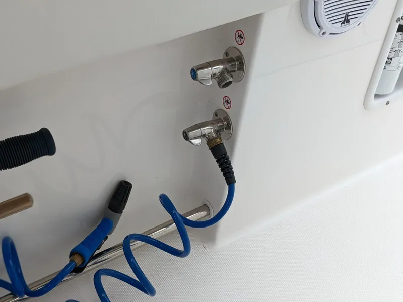 Slide: The Image of 2021 Edgewater 262 CC boat washdown hose and fittings. - 20