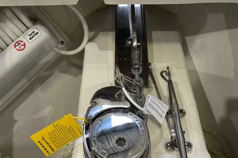 Slide: The Image of 2023 Cobia 240DC anchor windlass system in boat's anchor locker. - 8