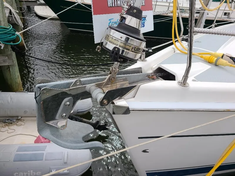Slide: The Image of Bow of a 2004 Hunter 466 sailboat with anchor and winch system. - 13