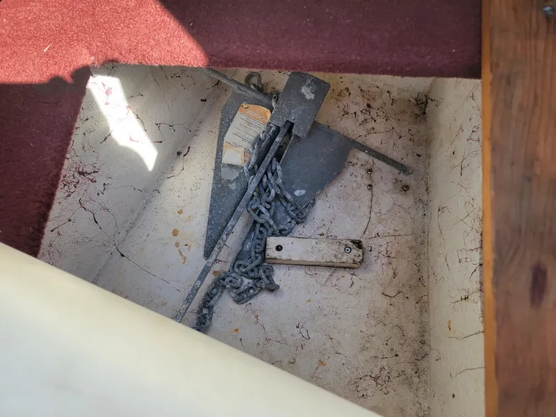 Slide: The Image of Anchor storage compartment in a 1991 Maxum 2100 XC boat. - 20