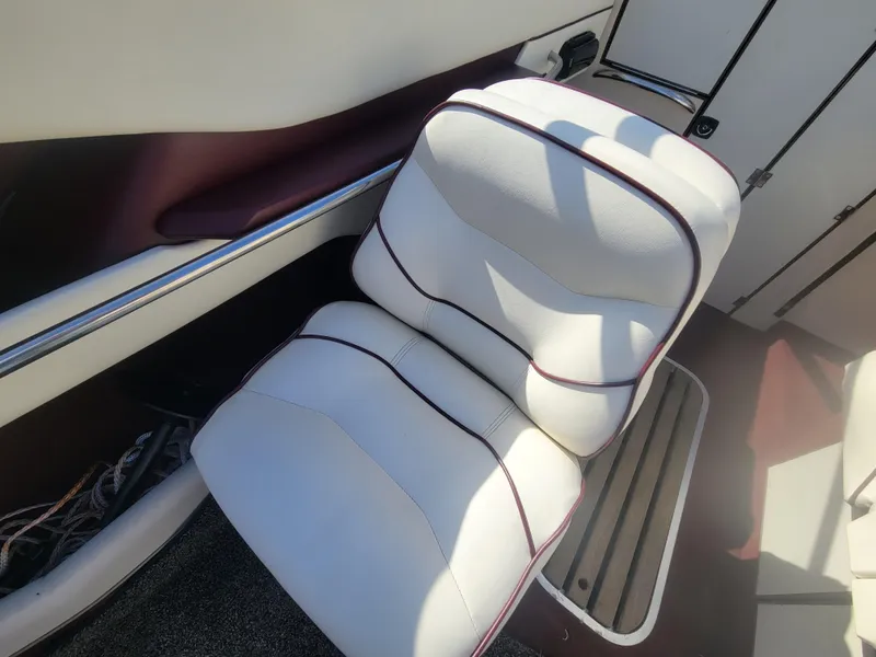 Slide: The Image of White seat in a 1991 Maxum 2100 XC boat interior. - 7