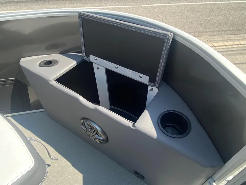 Slide: The Image of Godfrey MIGHTY G 1476F 2023 boat storage compartment with cup holders. - 6