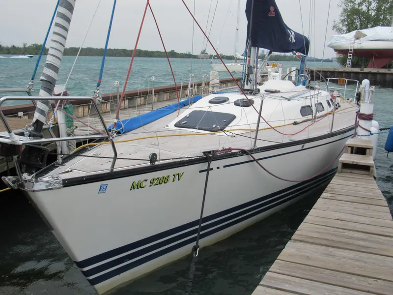 The Image of 2000 X-Yachts X-412 sailboat docked at a marina, featuring sleek design and modern rigging. - 0