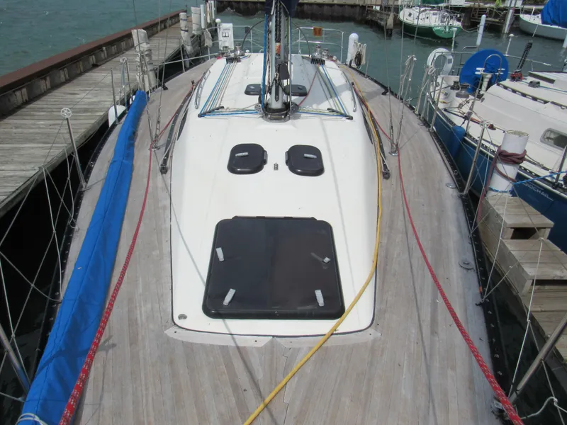 Slide: The Image of Deck view of 2000 X-Yachts X-412 sailboat docked at marina. - 24