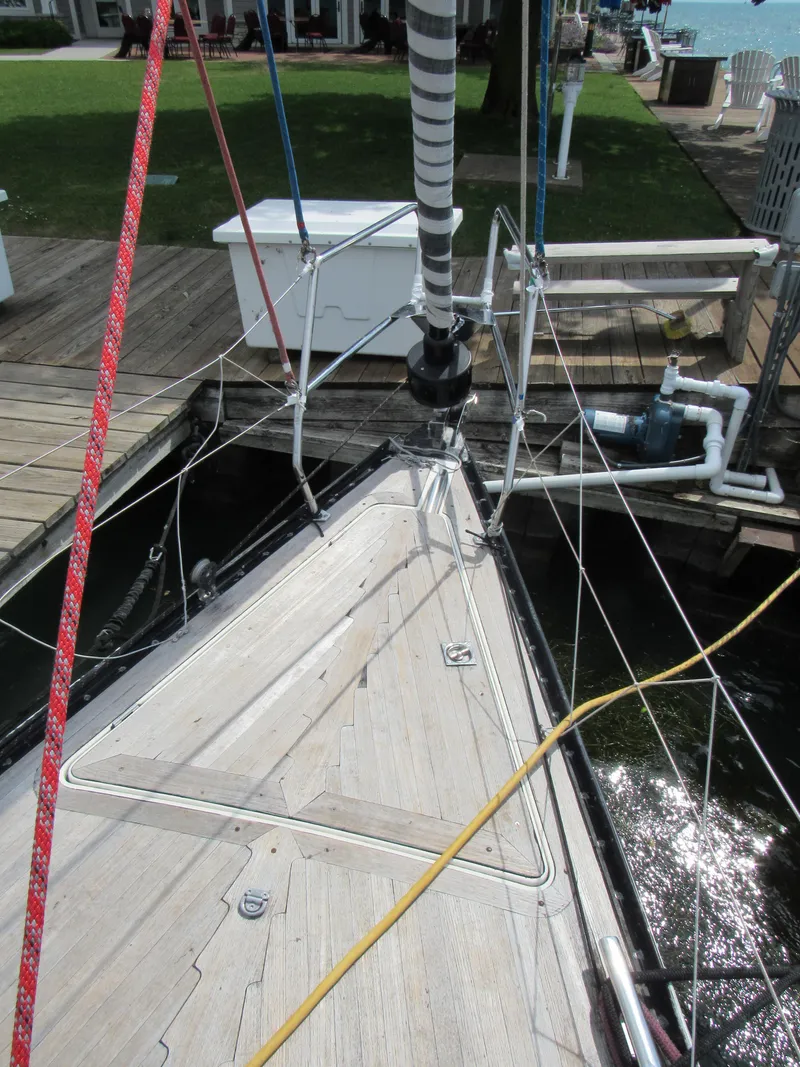 Slide: The Image of Bow of 2000 X-Yachts X-412 sailboat docked, featuring deck and rigging details. - 26