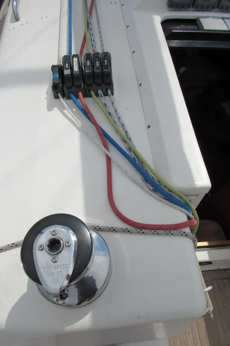 Slide: The Image of Sailing yacht X-Yachts X-412 (2000) deck with winch and colorful ropes. - 36