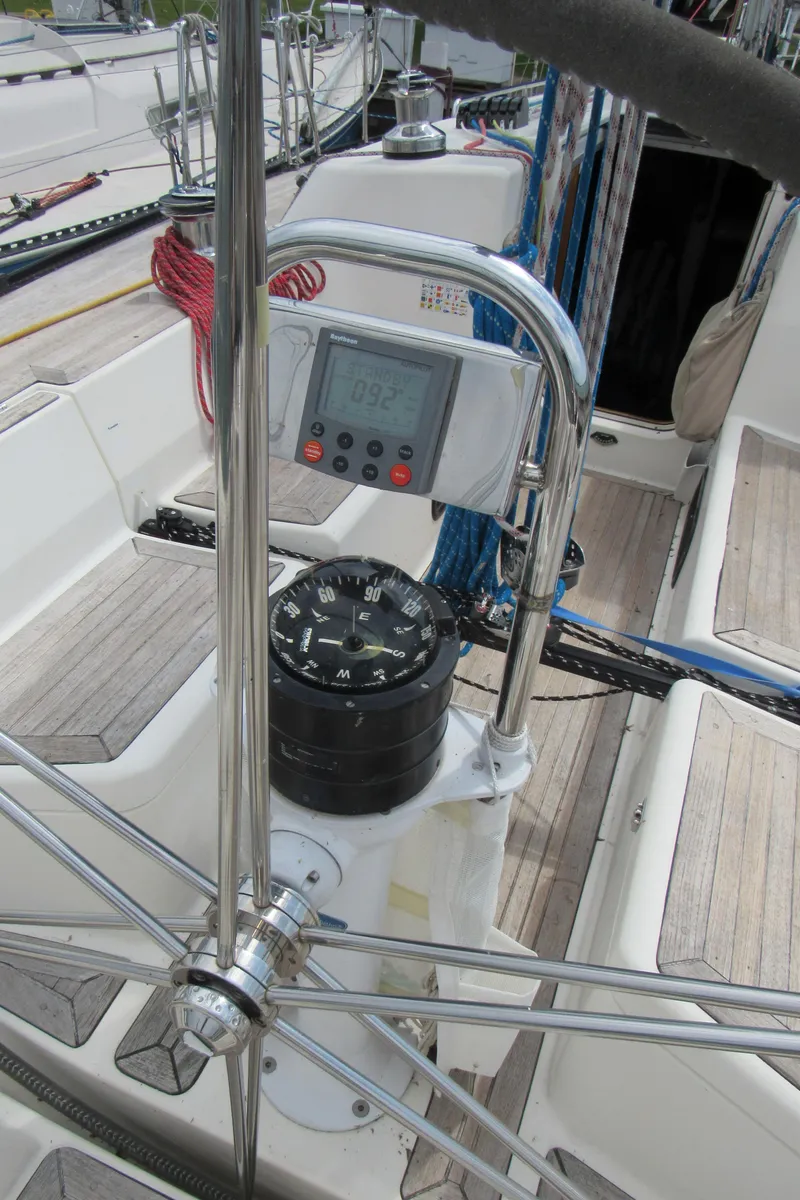 Slide: The Image of Steering wheel and navigation instruments on a 2000 X-Yachts X-412 sailboat. - 39