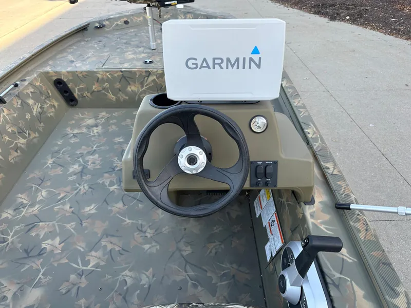 Slide: The Image of 2023 Tracker Grizzly 1754 SC boat with Garmin navigation system. - 4